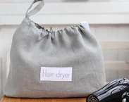 Grey Linen hair dryer bag for beach house, Airbnb blow dryer holder, hotel bathroom hairdryer organizer, hair accessories storage