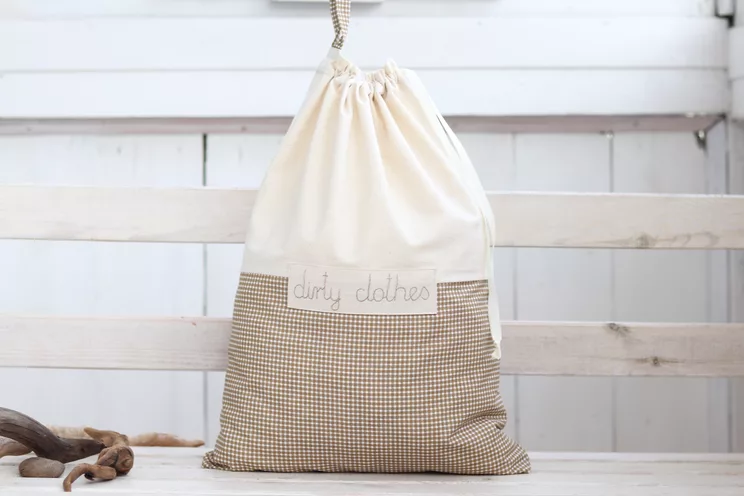 CREAM COLOURED LAUNDRY BAG FOR DIRTY LINEN 